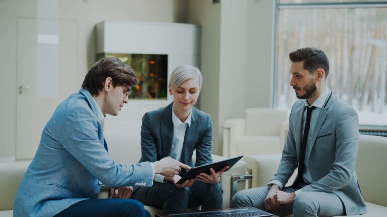 Consultants meeting a client using AI tools for consulting firms
