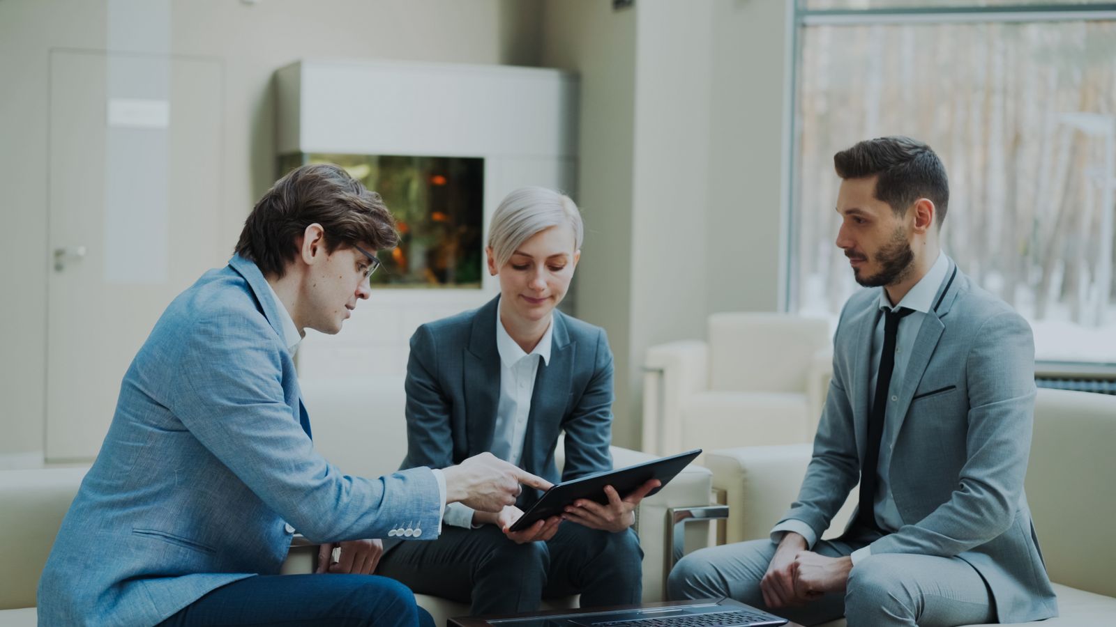 Consultants meeting a client using AI tools for consulting firms