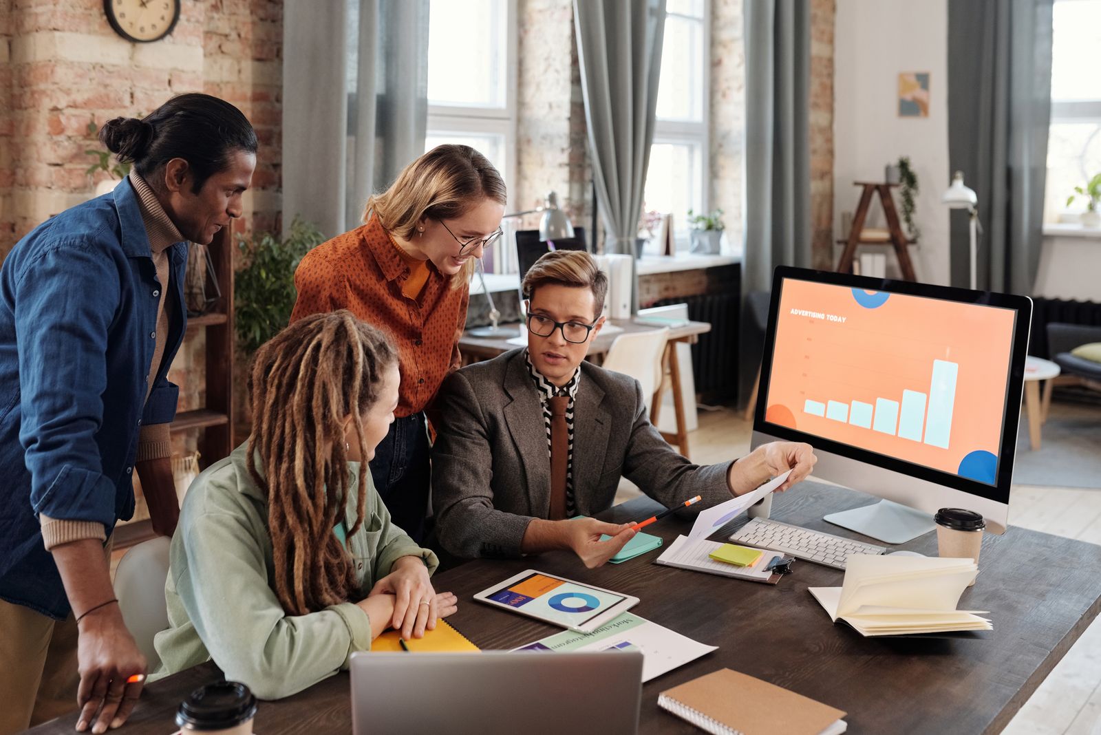 Marketing team reviewing an AI marketing analytics dashboard
