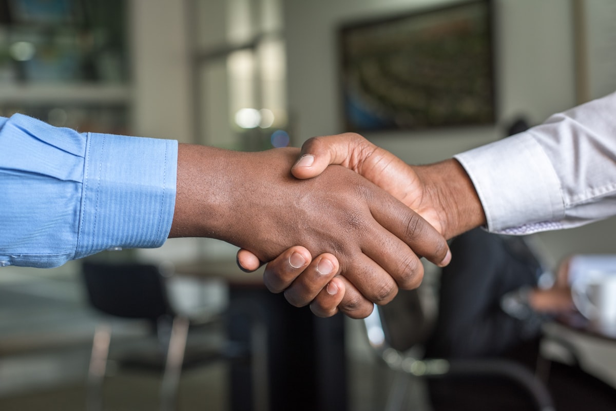 Lawyers discussing priorities in a meeting
